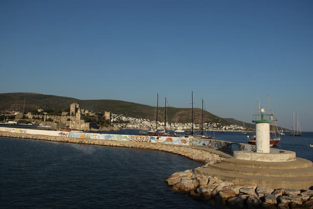 Bodrum Castle and the white town seen across the harbor from the breakwater